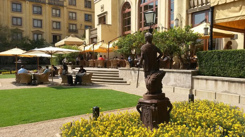 Palazzo Hotel Форуэйс Экстерьер фото The hotel's garden